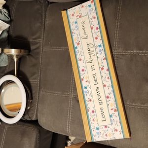 Wooden 'love grows best in happy homes'